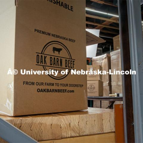 Box of meat at Oak Barn Beef in Westpoint, Nebraska. Behind the scenes photo for the university's new "Home Again" national advertisement. June 27, 2024. Photo by Kristen Labadie / University Communication.   